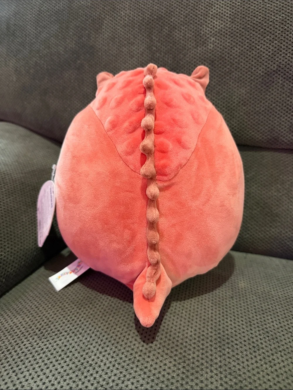Squishmallows Armando Carnotaraus Plush Winking dinosaur